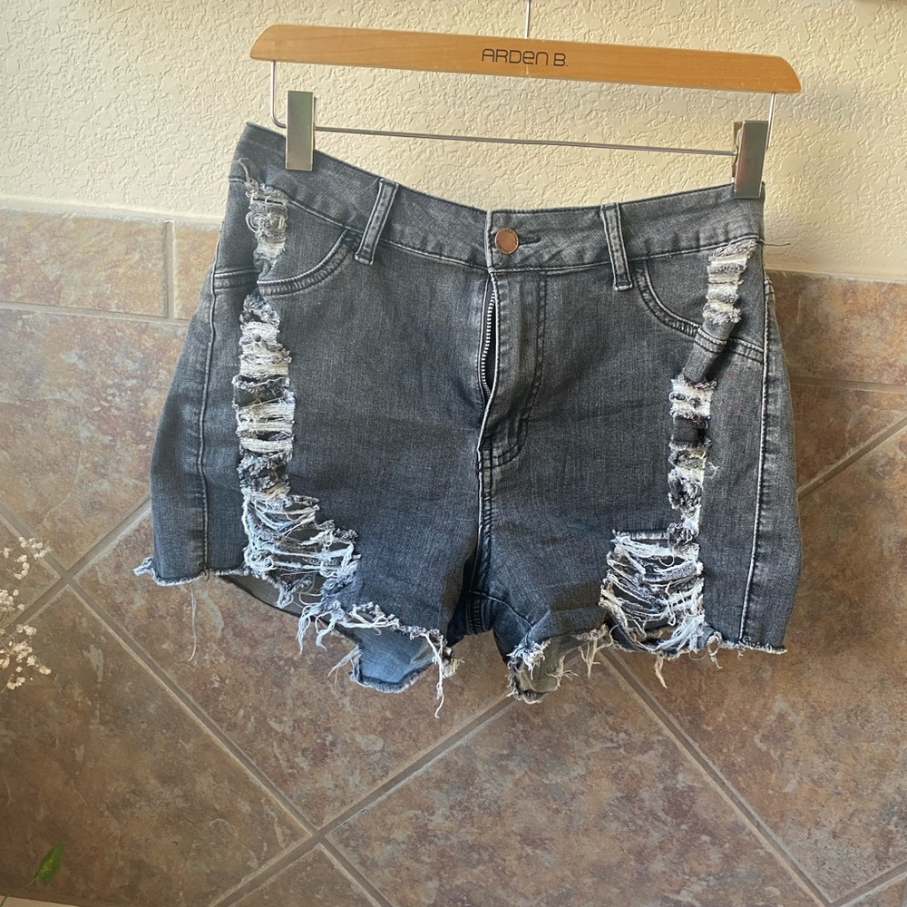 Not sure of brand. Never worn, high waisted, ripped, gray shorts. Size large